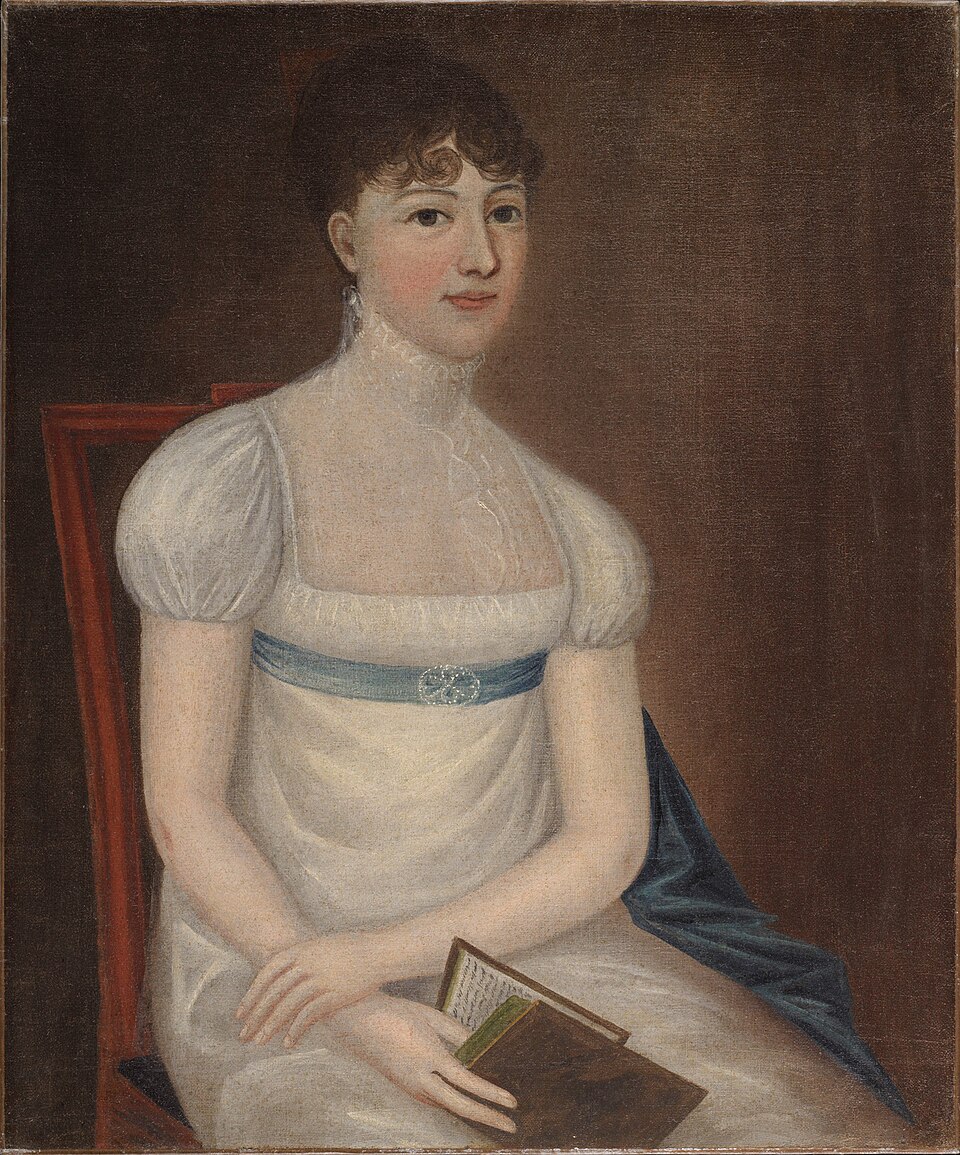 A portrait of a young girl in a pale dress